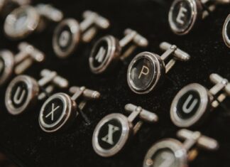 manschettknappar bokstäver